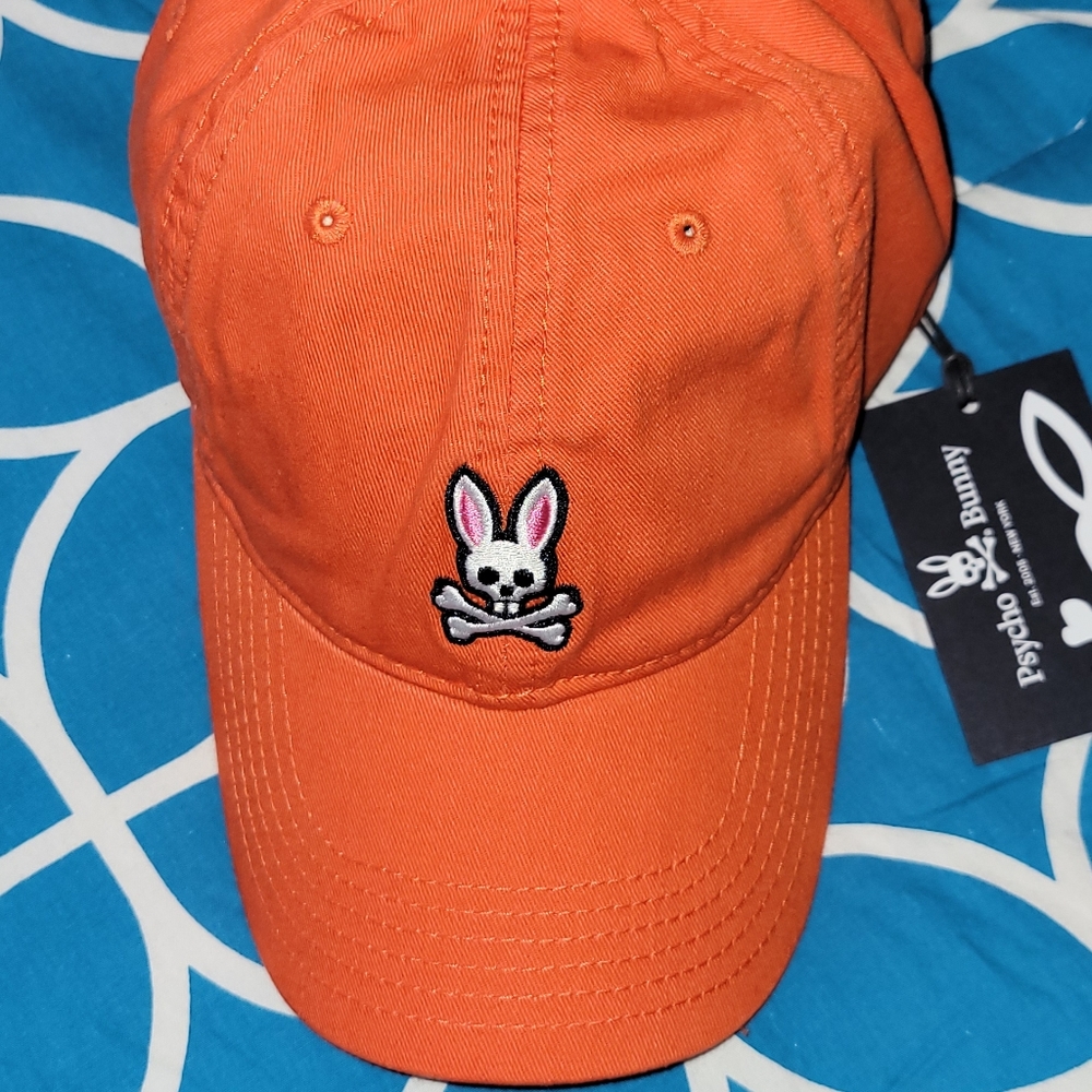 Adjustable strap cap